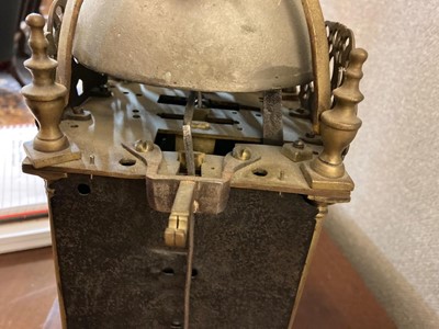 Lot 354 - A brass lantern clock