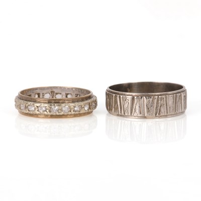 Lot 167 - An 18ct white gold band ring and a 9ct bicoloured gold eternity ring