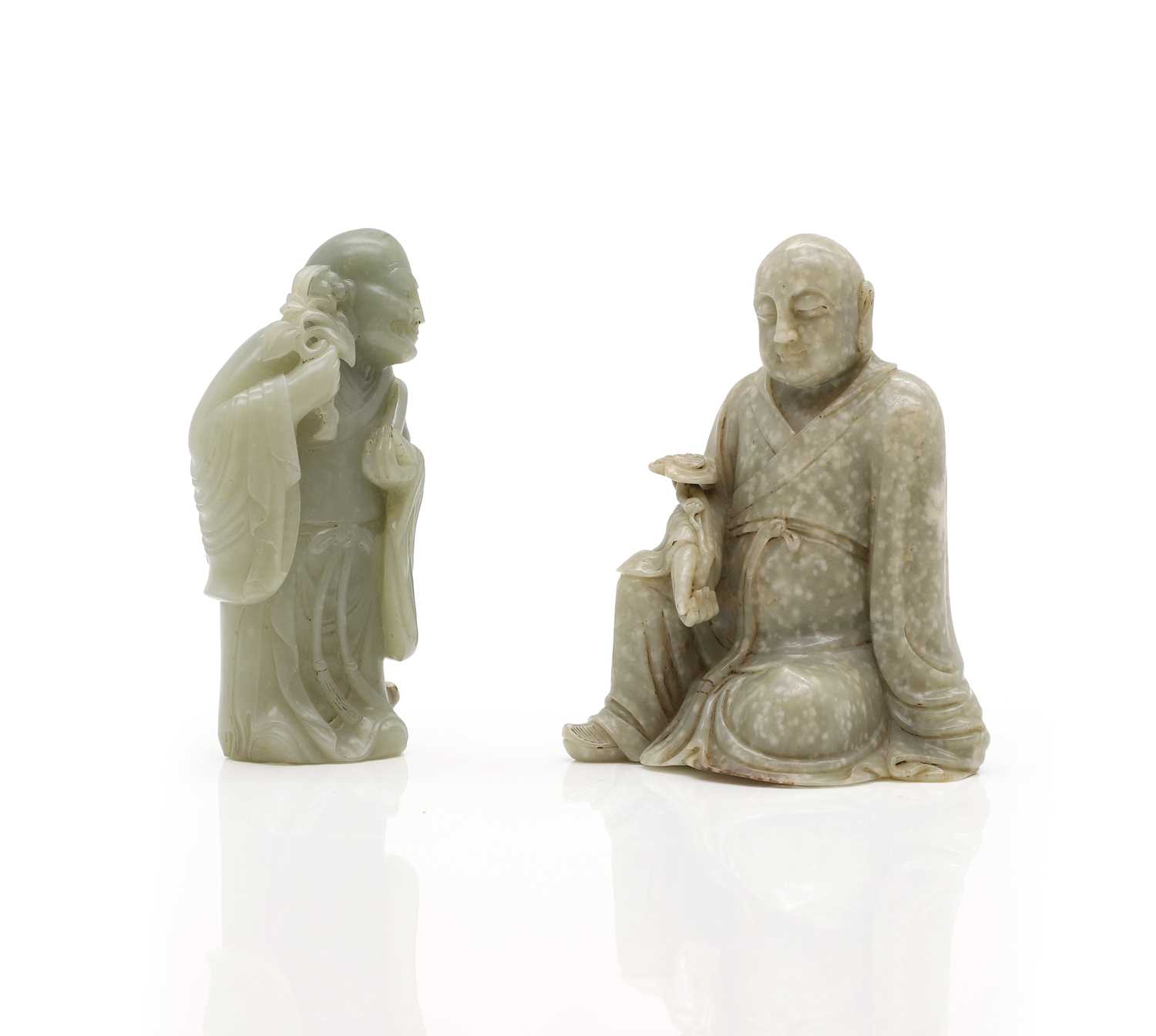 Lot 59 - Two Chinese jade monks