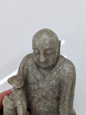 Lot 59 - Two Chinese jade monks