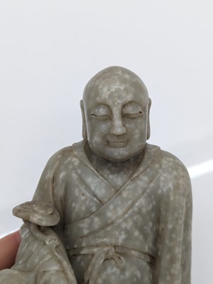 Lot 59 - Two Chinese jade monks