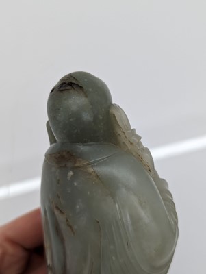 Lot 59 - Two Chinese jade monks