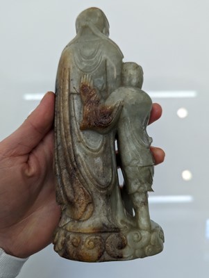 Lot 58 - A Chinese jade group