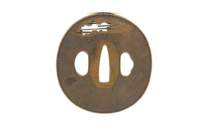 Lot 87 - A Japanese engraved copper tsuba