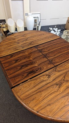 Lot 238 - A Danish rosewood dining suite