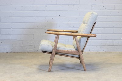Lot 251 - A Danish oak 'GE 240 Cigar' armchair