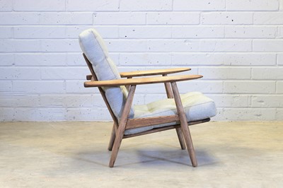 Lot 251 - A Danish oak 'GE 240 Cigar' armchair