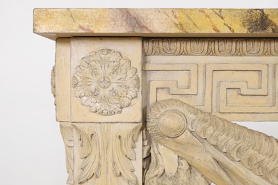 Lot 573 - A George II-style carved and painted pine console table in the manner of William Kent