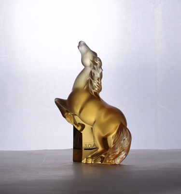 Lot 263 - A Lalique amber glass 'Kazak' horse