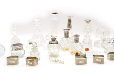Lot 48 - A group of five silver mounted cut glass bottles