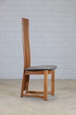 Lot 232 - A set of six Danish post-modernist oak dining chairs