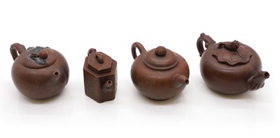 Lot 68 - A collection of four Chinese Yixing stoneware teapots