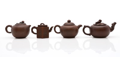 Lot 68 - A collection of four Chinese Yixing stoneware teapots