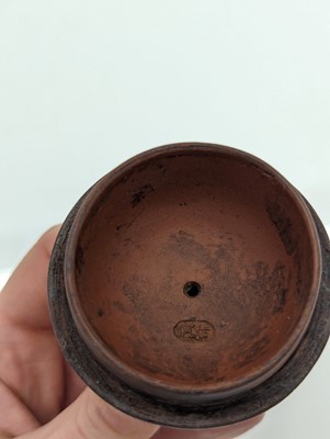 Lot 68 - A collection of four Chinese Yixing stoneware teapots