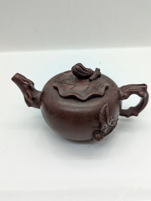 Lot 68 - A collection of four Chinese Yixing stoneware teapots