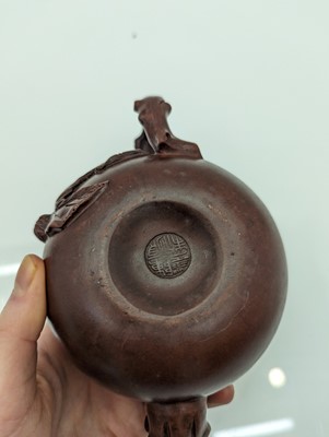 Lot 68 - A collection of four Chinese Yixing stoneware teapots