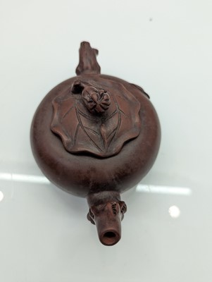 Lot 68 - A collection of four Chinese Yixing stoneware teapots