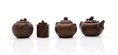 Lot 68 - A collection of four Chinese Yixing stoneware teapots