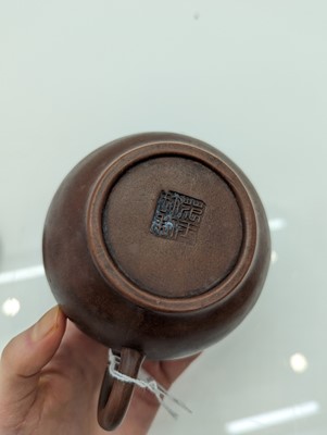 Lot 68 - A collection of four Chinese Yixing stoneware teapots