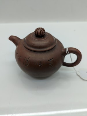 Lot 68 - A collection of four Chinese Yixing stoneware teapots