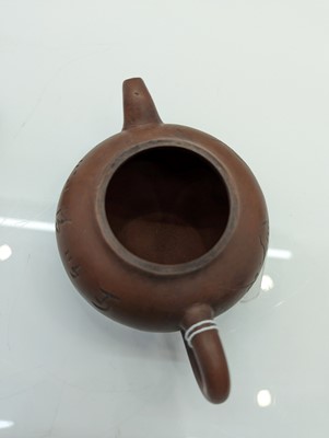Lot 68 - A collection of four Chinese Yixing stoneware teapots