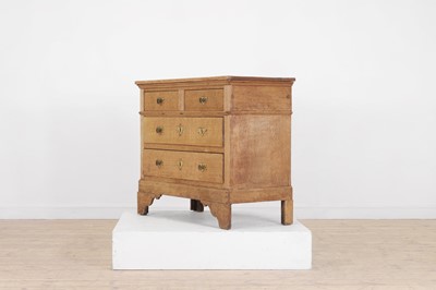Lot 79 - A pale oak chest of drawers
