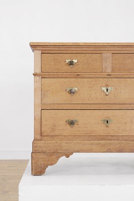 Lot 79 - A pale oak chest of drawers