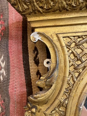Lot 50 - A George III-style giltwood and gesso overmantel mirror