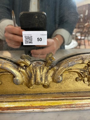 Lot 50 - A George III-style giltwood and gesso overmantel mirror