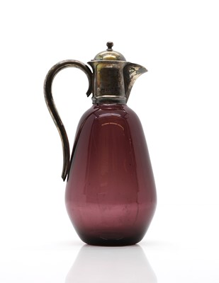 Lot 13 - A late Victorian silver and amethyst glass carafe
