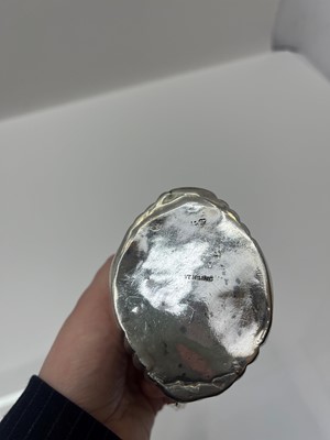 Lot 15 - A silver sugar basket