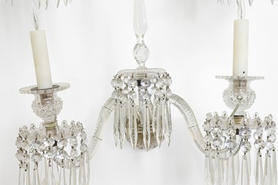 Lot 137 - A set of three cut-glass wall lights