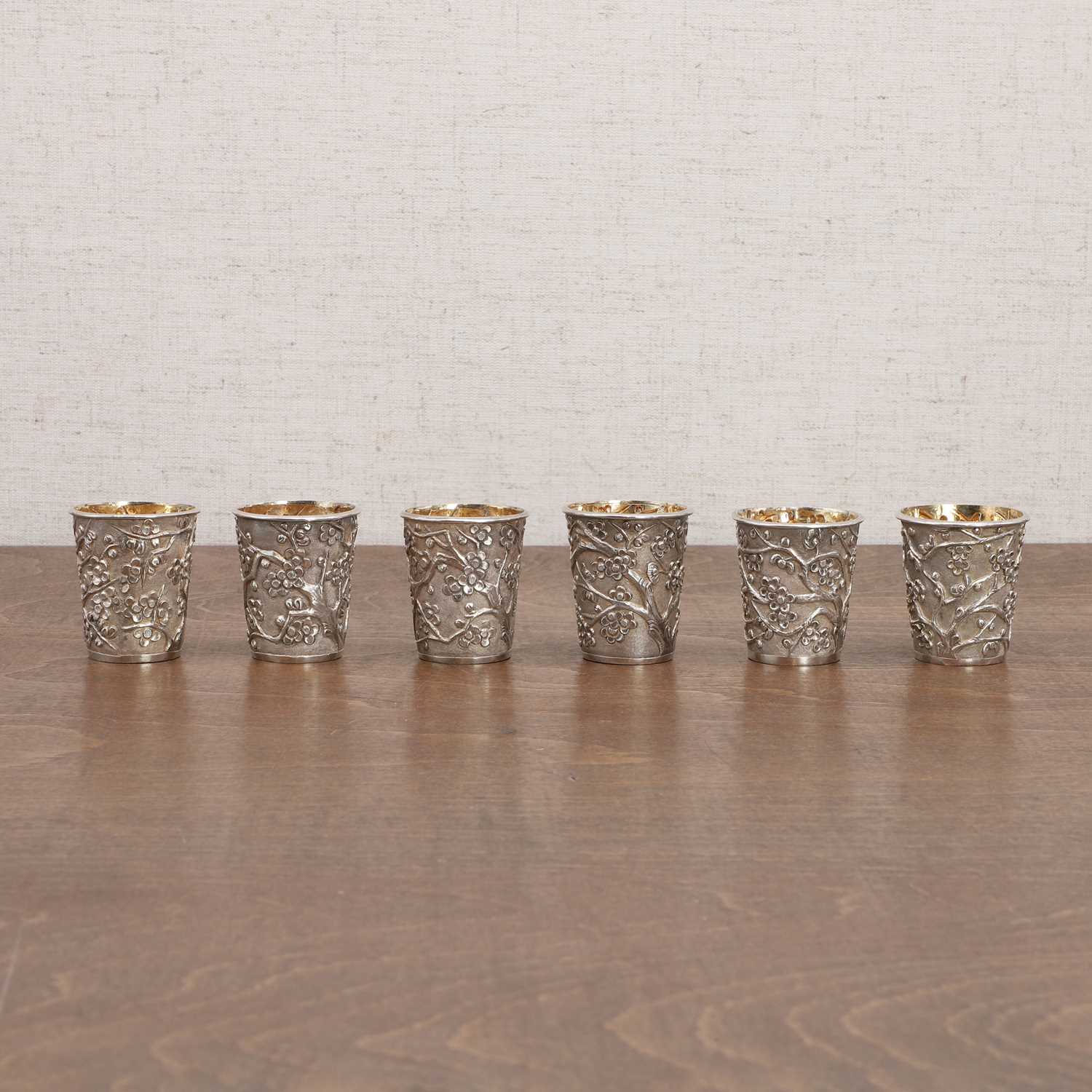 Lot 128 - A group of Chinese silver beakers