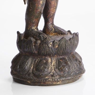 Lot 144 - A Chinese gilt-bronze model of the infant Buddha