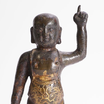 Lot 144 - A Chinese gilt-bronze model of the infant Buddha