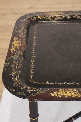 Lot 93 - A papier mâché lacquered tray top table