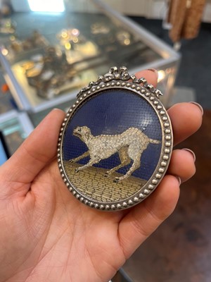 Lot 244 - A circular micromosaic panel