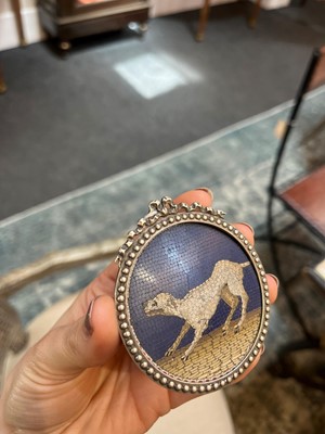 Lot 244 - A circular micromosaic panel