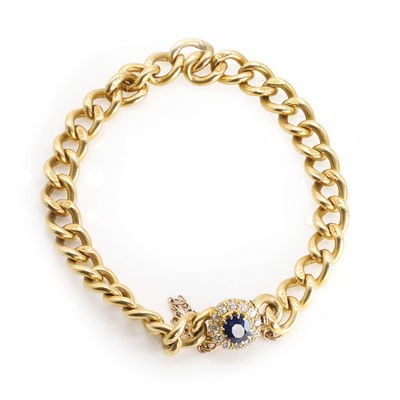Lot 45 - An 18ct gold solid curb link bracelet with a sapphire and diamond clasp