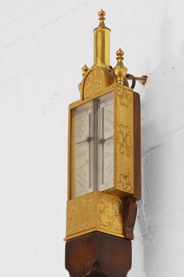 Lot 168 - A William and Mary-style walnut and gilt-metal portable pillar barometer