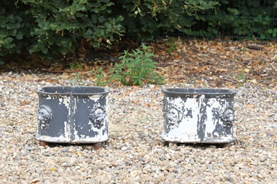 Lot 58 - A pair of cast iron planters