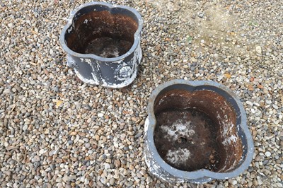 Lot 58 - A pair of cast iron planters