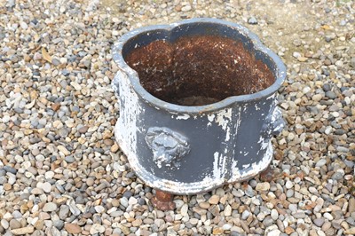Lot 58 - A pair of cast iron planters