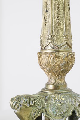 Lot 35 - A pair of George IV brass candlesticks