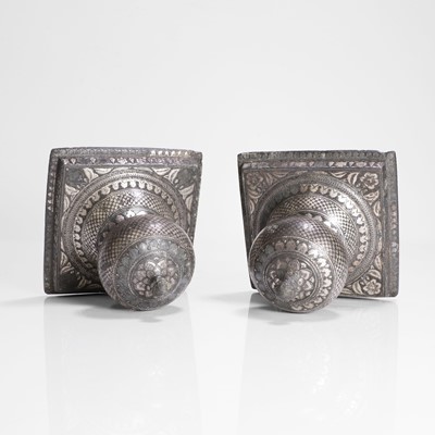 Lot 224 - A pair of Indian silver-inlaid Bidri carpet weights