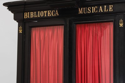 Lot 202 - A pair of ebonised wooden library bookcases