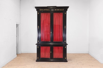 Lot 202 - A pair of ebonised wooden library bookcases