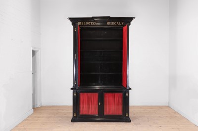 Lot 202 - A pair of ebonised wooden library bookcases