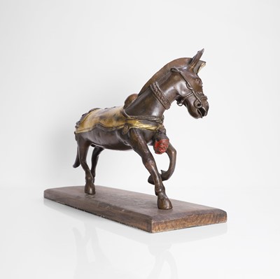 Lot 147 - A Tibetan parcel-gilt bronze model