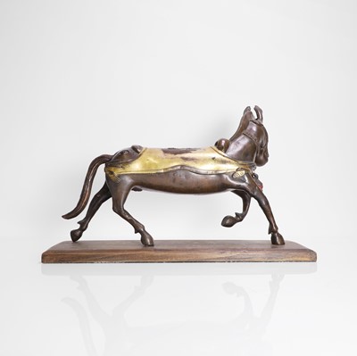 Lot 147 - A Tibetan parcel-gilt bronze model